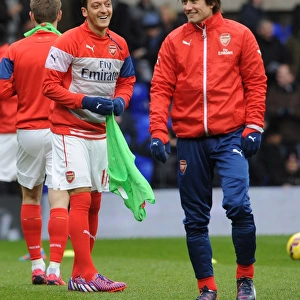 Arsenal Players Mesut Ozil and Tomas Rosicky Warming Up Ahead of Tottenham Clash (2014-15)