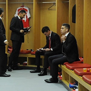 Arsenal Squad Unity: A Glimpse into the Home Changing Room before Arsenal vs. Everton (2015/16)