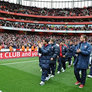 The Arsenal squad wave to the fans after the match. Arsenal 4: 0 Fulham