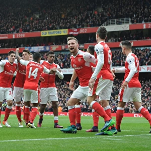 Arsenal Stars: Celebrating a Goal Against Tottenham in the Intense 2016-17 Premier League Clash