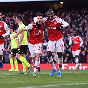 Arsenal Stars Martinelli and Pepe: Celebrating a Goal Against Sheffield United (2019-20)