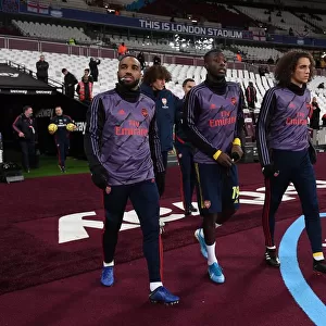 Arsenal Trio Ready for West Ham Clash: Lacazette, Pepe, Guendouzi