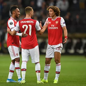 Arsenal Triumph: Aubameyang, Chambers, and Luiz Celebrate Europa League Victory over Eintracht Frankfurt