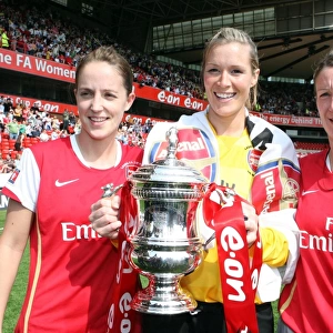 Arsenal Triumphs: Yvonne Tracy, Emma Byrne, and Ciara Grant with the FA Cup after a 4:1 Victory over Leeds United