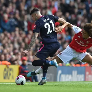 Arsenal vs. AFC Bournemouth: Matteo Guendouzi Tackles Diego Rico in Premier League Clash