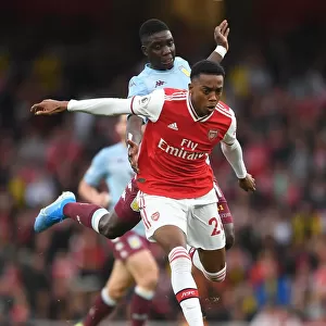 Arsenal vs Aston Villa: Joe Willock Clashes with Marvelous Nakamba in Premier League Showdown