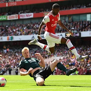 Arsenal vs Burnley: Maitland-Niles Leaps Past Mee in Premier League Clash