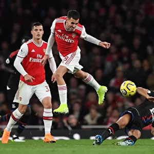 Arsenal vs Crystal Palace: Ceballos Heads a Contested Ball in Premier League Clash