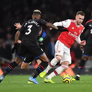 Arsenal vs Crystal Palace: A Clash Between Chambers and van Aanholt in the Premier League