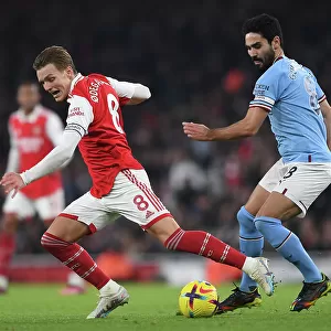 Arsenal vs Manchester City: Intense Battle between Odegaard and Gundogan in the 2022-23 Premier League