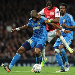 Arsenal vs Marseille: Gervinho vs Rod Fanni - UEFA Champions League Clash