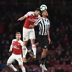 Arsenal vs Newcastle: Intense Battle between Rondon and Sokratis