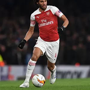 Arsenal vs. S.S.C. Napoli - Mohamed Elneny in Action during the 2018-19 Europa League Quarterfinal First Leg at Emirates Stadium