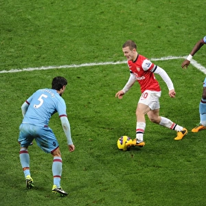 Arsenal vs. West Ham: Wilshere Clashes with Tomkins and Demel