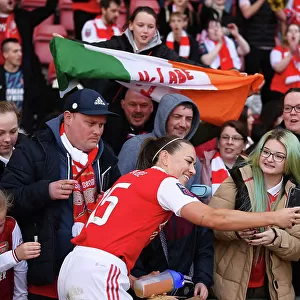 Arsenal Women Celebrate FA WSL Title: Katie McCabe Amidst Jubilant Fans