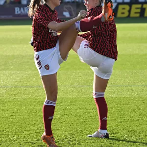 Arsenal Women Prepare for Birmingham City Women Showdown in FA WSL: Katie McCabe and Caitlin Foord Warm Up