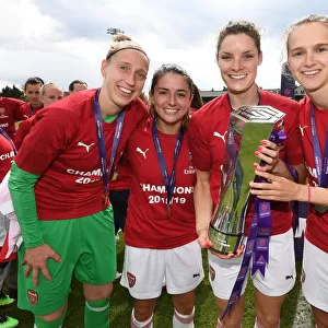Arsenal Women's Historic Title Win: Van Veenendaal, Van de Donk, Bloodworth, and Miedema Celebrate with the Trophy