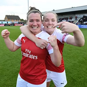 Arsenal Women's Mitchell and Little in Triumphant Victory Celebration