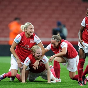 Arsenal Women's Team Celebrate Goal Against Chelsea in WSL Action