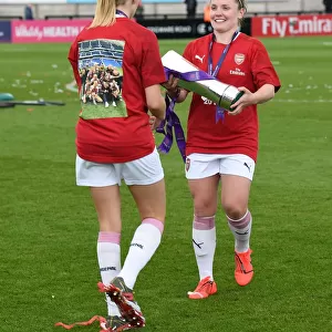 Arsenal Women's Team: Kim Little and Leah Williamson Lift the WSL Trophy