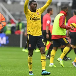 Arsenal's Ainsley Maitland-Niles Celebrates with Fans after Newcastle Victory