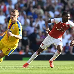 Arsenal's Ainsley Maitland-Niles Clashes with Crystal Palace's Max Meyer in Premier League Showdown