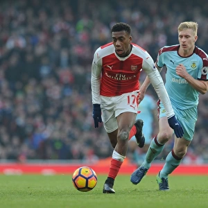 Arsenal's Alex Iwobi Clashes with Burnley's Ben Mee in Premier League Showdown