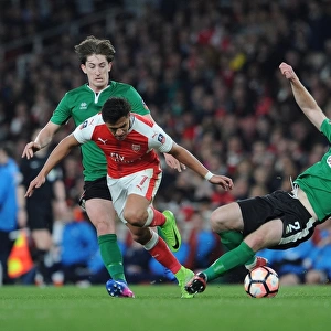 Arsenal's Alexis Sanchez Outmaneuvers Lincoln's Defenders in FA Cup Quarter-Final Showdown