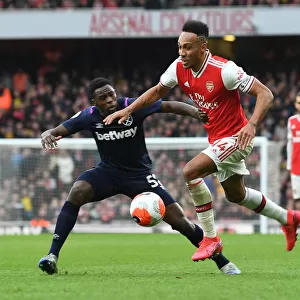 Arsenal's Aubameyang Faces Off Against West Ham's Nhakia in Premier League Clash