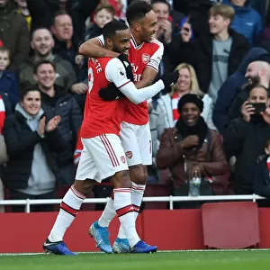 Arsenal's Aubameyang and Lacazette Celebrate Goal Against Chelsea in Premier League Clash