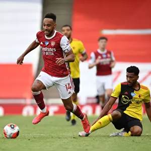 Arsenal's Aubameyang Outmaneuvers Watford's Mariappa in Premier League Clash