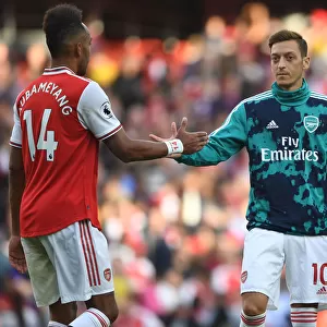 Arsenal's Aubameyang and Ozil: United in Victory After Arsenal vs. Tottenham (2019-20)
