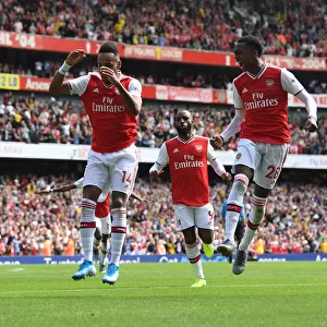 Arsenal's Aubameyang and Willock Celebrate Goals Against Burnley in 2019-20 Premier League