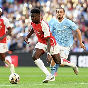 Arsenal's Bukayo Saka Faces Off Against Manchester City's Bernardo Silva in FA Community Shield Showdown