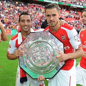 Arsenal's Cazorla and Ramsey Celebrate FA Community Shield Victory over Manchester City