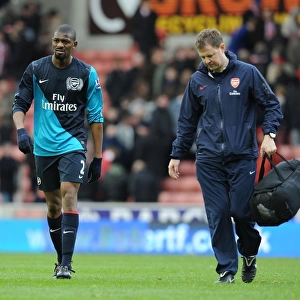 Arsenal's Colin Lewin Tends to Injured Abou Diaby vs Stoke City (2012)