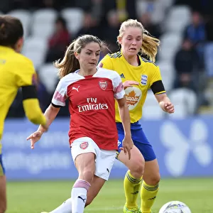 Arsenal's Danielle van de Donk Clashes with Birmingham's Sarah Mayling in WSL Action