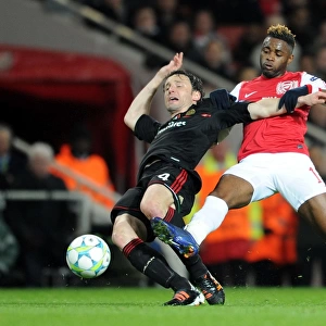 Arsenal's Dominant Performance: 3-0 Over AC Milan in Champions League Round of 16 (Alex Song vs Mark van Bommel)