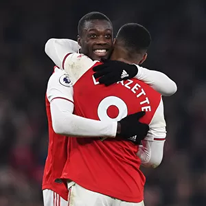 Arsenal's Double Act: Pepe and Lacazette Celebrate Goals Against Manchester United (2019-20)