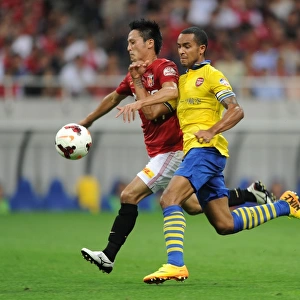 Arsenal's East Asian Showdown: Theo Walcott vs. Kunimitsu Sekiguchi