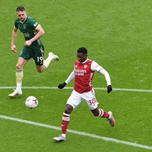 Arsenal's Eddie Nketiah Clashes with Sheffield United's Jack Robinson in Premier League Showdown