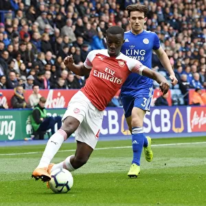 Arsenal's Eddie Nketiah Outmaneuvers Leicester's Ben Chilwell in Thrilling Premier League Clash (Leicester City vs Arsenal, 2018-19)