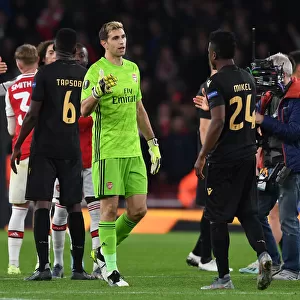 Arsenal's Emi Martinez and Mikel Agu Share a Moment after Arsenal v Vitoria Europa League Clash