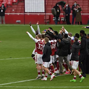 Arsenal's Euphoric Moment: Celebrating Victory Over Brighton & Hove Albion in the 2020-21 Premier League