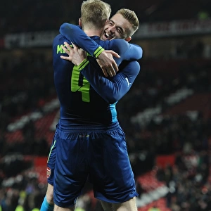 Arsenal's Glory: Mertesacker and Chambers Celebrate FA Cup Quarterfinal Victory over Manchester United