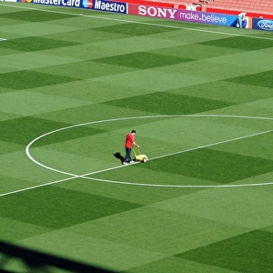 Arsenal's Groundsman Paul Ashcroft Prepares Emirates Pitch for Champions League Glory