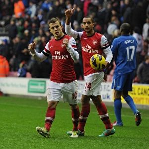 Arsenal's Hard-Fought Victory over Wigan Athletic (2012-13): Jack Wilshere and Theo Walcott Celebrate