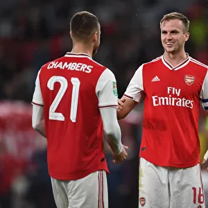 Arsenal's Holding and Chambers Celebrate Carabao Cup Victory over Nottingham Forest
