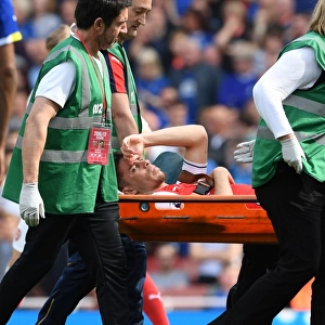 Arsenal's Injured Gabriel Carried Off the Pitch During Arsenal v Everton Match