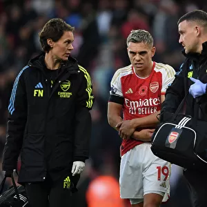 Arsenal's Injured Trossard Tended to by Medical Team During Arsenal v Burnley Match, 2023-24